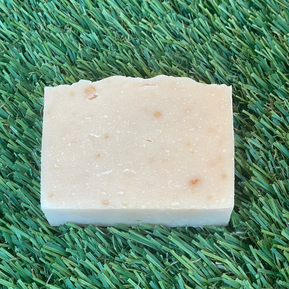 Mango bar soap made with mango powder, shea butter, and olive oil to cleanse, moisturize, and brighten dull, dry skin.