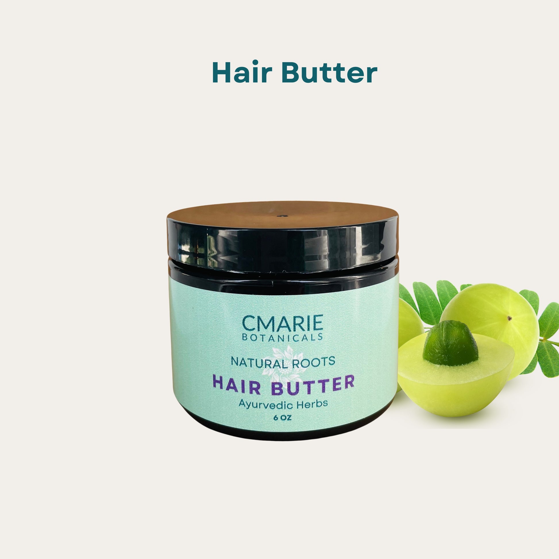 CMARIE Botanicals Natural Roots Hair Butter, Ayurvedic Herbs, 6 oz jar. The jar is placed beside fresh Amla fruits on a clean, minimal background.