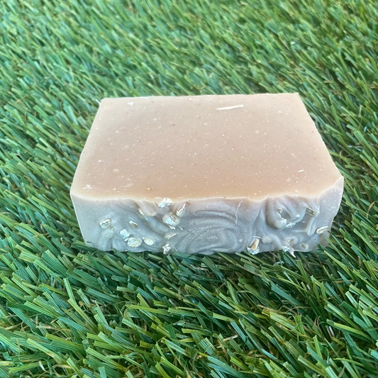 Handcrafted oatmeal soap with shea butter, olive oil, and colloidal oats for gentle cleansing and soothing sensitive skin.